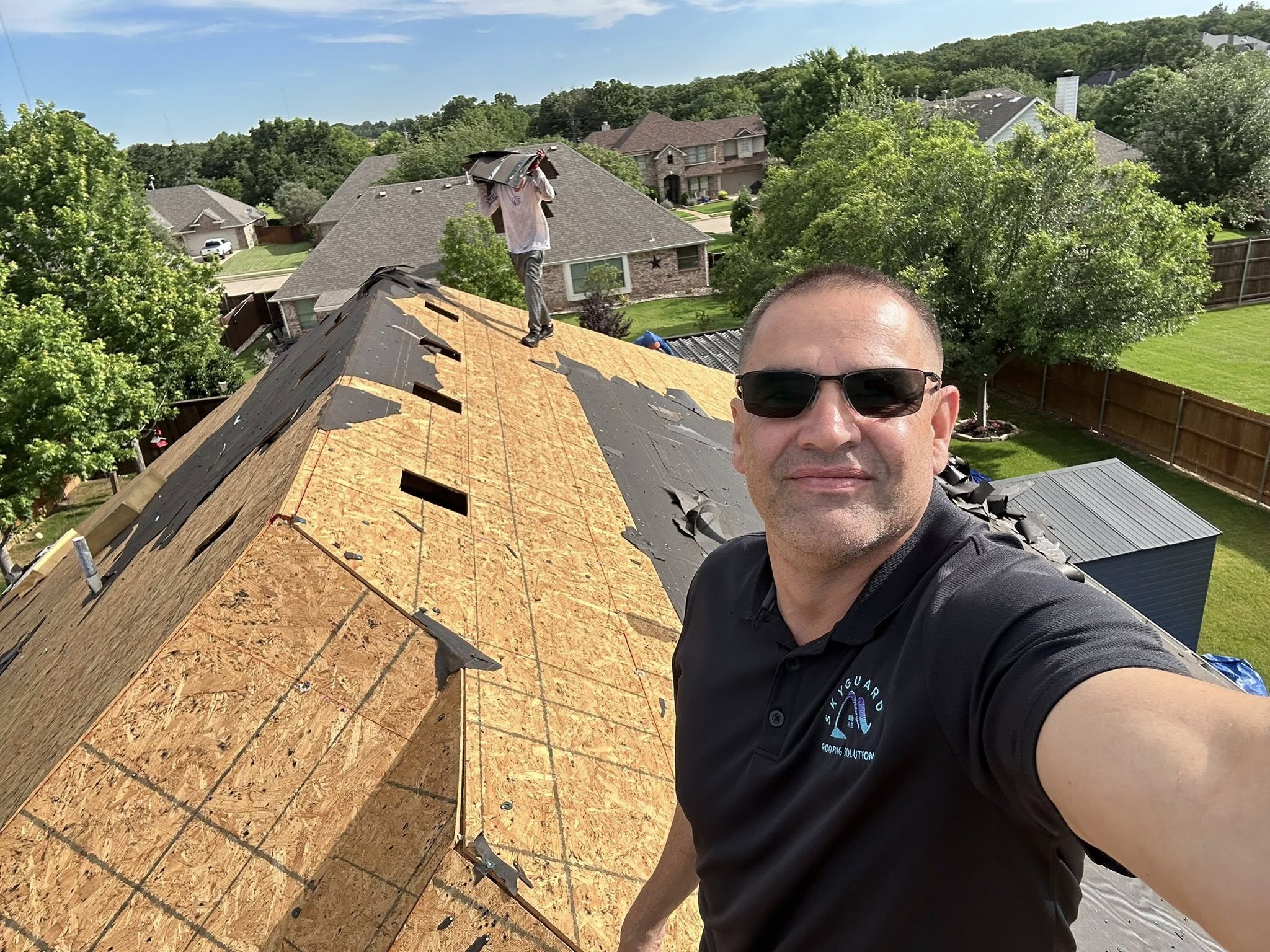Lakeside home near Lake Granbury Texas with algae-resistant roofing materials